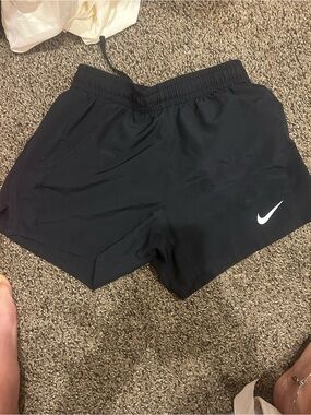 Nike Black Girls' Athletic Shorts with White Swoosh